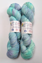 Load image into Gallery viewer, Sea Foam on superwash merino/nylon/sparkle sock yarn.

