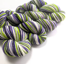 Load image into Gallery viewer, Multicolored yarn skeins on a white background
