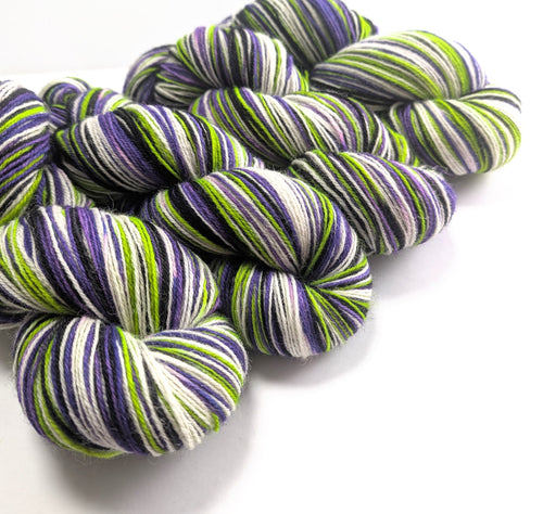 Multicolored yarn skeins on a white background