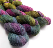 Load image into Gallery viewer, Awaken on 100% llama 4ply/fingering weight yarn. Grey base.
