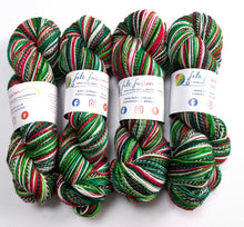 Load image into Gallery viewer, Four skeins of multicolored yarn with 'felt fusion' labels on a white background
