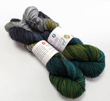 Load image into Gallery viewer, Misty Mountains on high twist superwash merino/nylon "Zebra" sock yarn.
