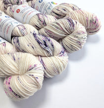 Load image into Gallery viewer, Gothic Speckles on superwash merino/cashmere/nylon DK yarn.
