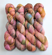 Load image into Gallery viewer, Frankenskein on superwash merino singles 4ply yarn.
