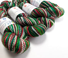 Load image into Gallery viewer, Colorful yarn skeins with labels on a white background
