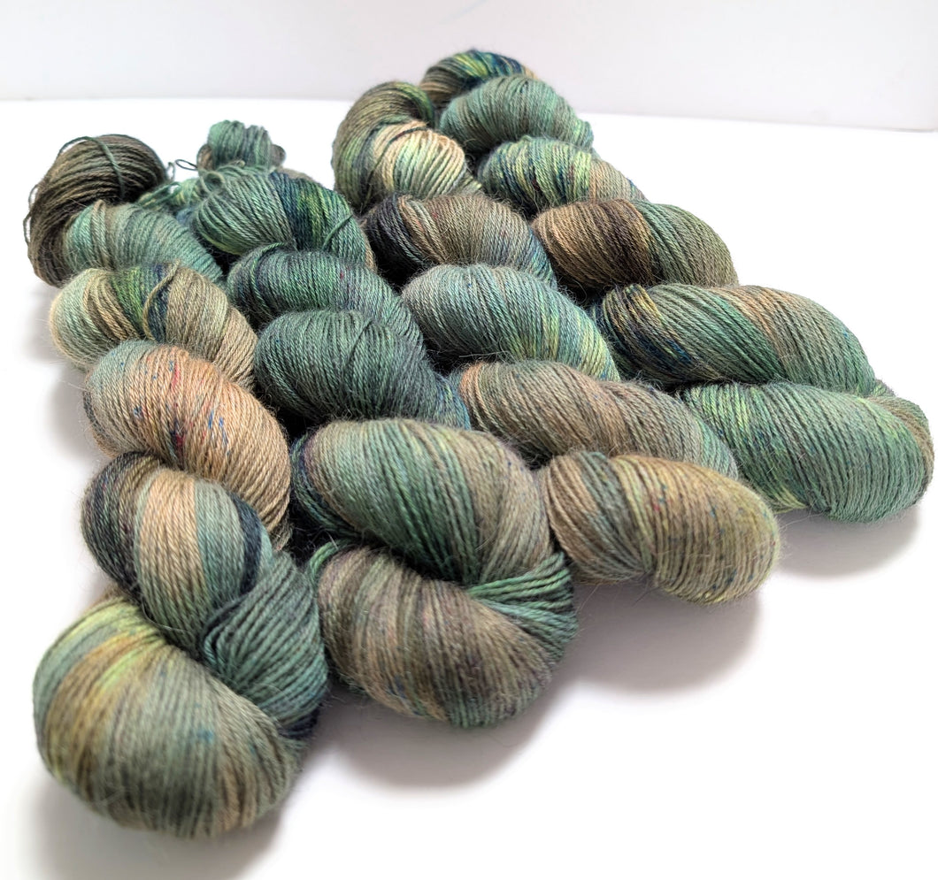 Entwood on 100% llama 4ply/fingering weight yarn. Natural base.