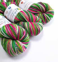 Load image into Gallery viewer, Colorful skeins of yarn with visible brand labels on a white background
