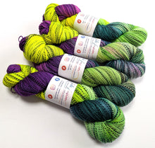 Load image into Gallery viewer, Frankenskein on high twist superwash merino/nylon "Zebra" sock yarn.
