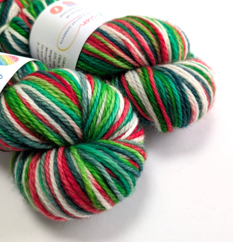 Multicolored yarn skeins on a white background