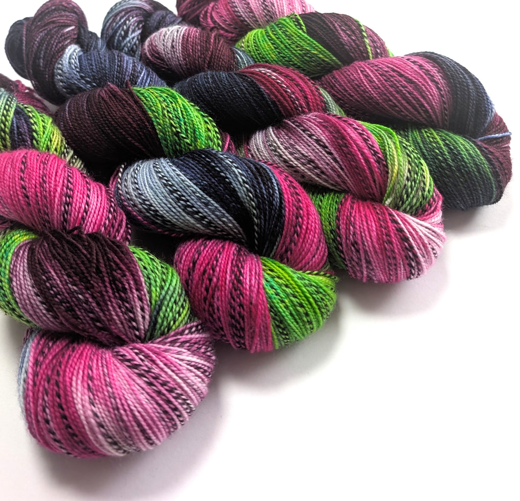 Multicolored yarn skeins on a white background