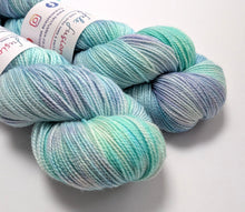 Load image into Gallery viewer, Sea Foam on superwash merino/nylon/sparkle sock yarn.
