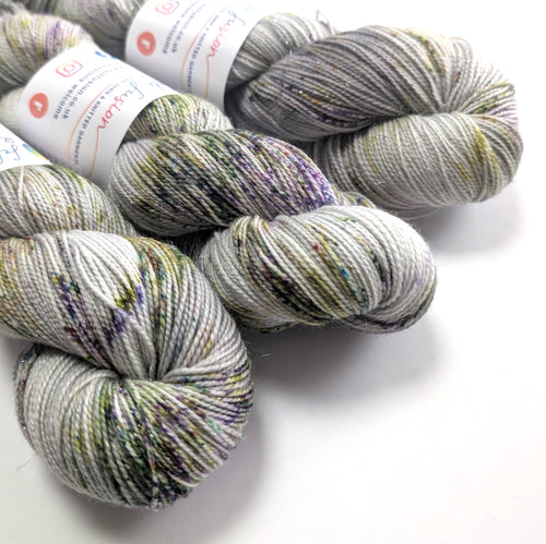 Silver yarn with purple and green