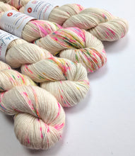 Load image into Gallery viewer, Colorful yarn skeins with visible brand labels on a white background
