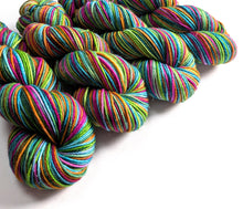 Load image into Gallery viewer, Colorful skeins of yarn on a white background
