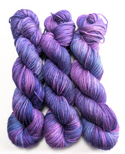 Load image into Gallery viewer, Three skeins of purple and blue yarn on a white background
