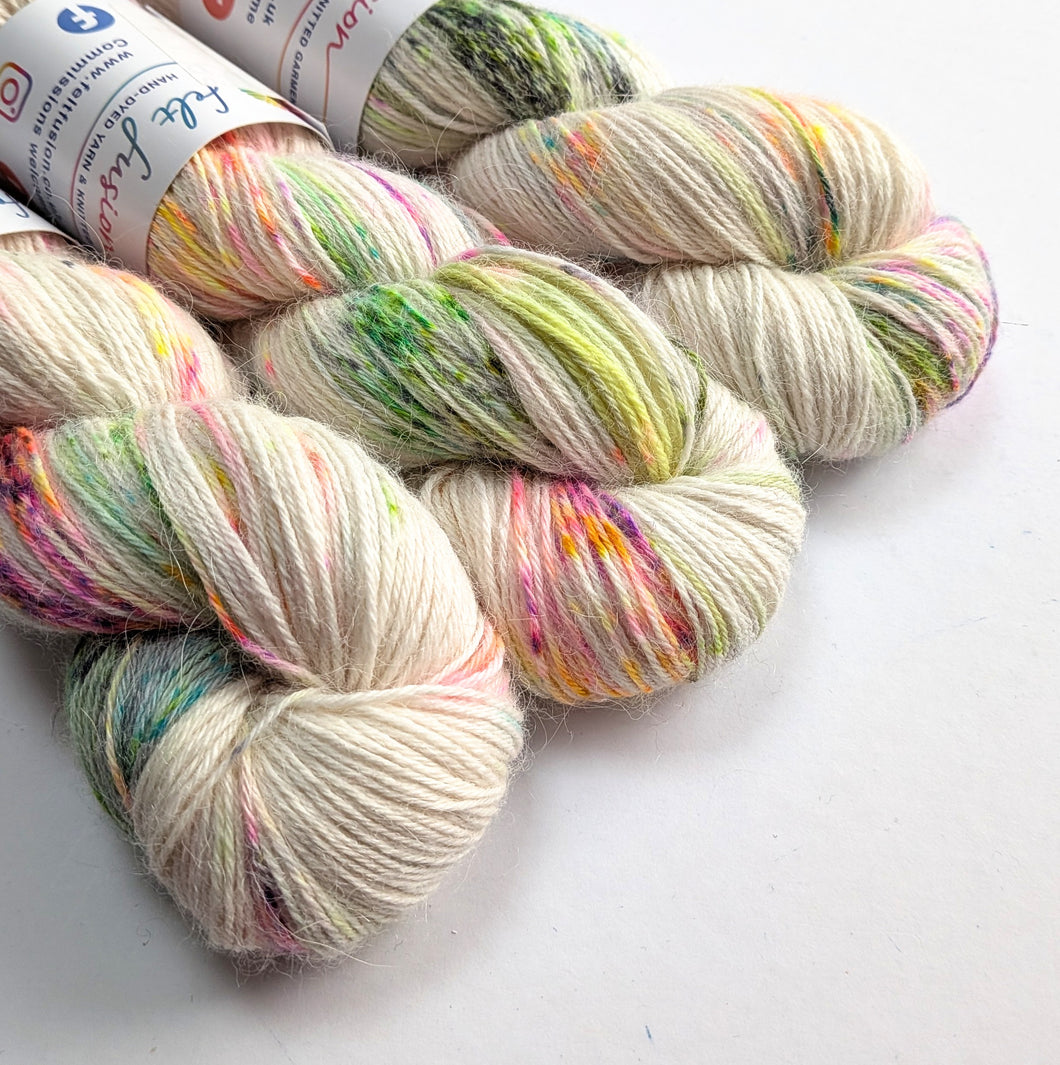 Multicolored yarn skeins on a white background