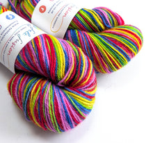 Load image into Gallery viewer, Colourful yarn skeins with labels on a white background

