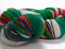 Load image into Gallery viewer, Holly Jolly Christmas on Exmoor sock yarn.
