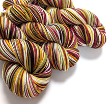 Load image into Gallery viewer, Vintage Christmas on superwash merino/nylon sock yarn.
