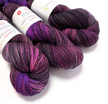 Load image into Gallery viewer, Solar dyed high twist superwash merino/nylon "Zebra" sock yarn.
