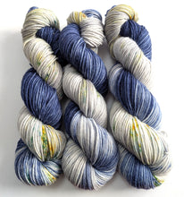 Load image into Gallery viewer, Three skeins of variegated and speckled yarn.
