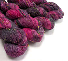 Load image into Gallery viewer, Frankenskein on superwash merino/neon neps 4ply/fingering weight.
