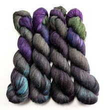 Load image into Gallery viewer, four skeins of multicolored yarn on a white background
