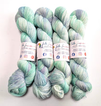 Load image into Gallery viewer, Sea Foam on 100% llama 4ply/fingering weight yarn.
