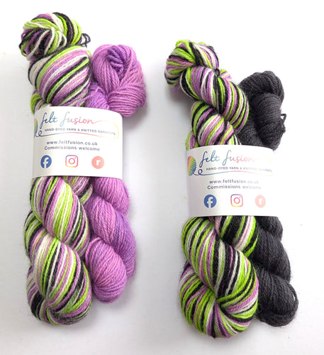 Two sets of multicolored yarn with labels on a white background