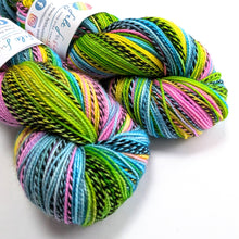 Load image into Gallery viewer, Colorful skeins of yarn with a brand label on a white background
