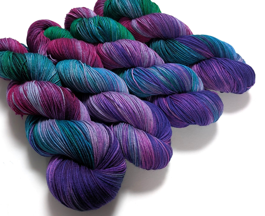 Peacock on superwash merino/nylon sock yarn.