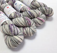 Load image into Gallery viewer, Gothic Speckles on high twist superwash merino/nylon "Zebra" sock yarn.
