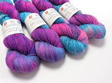 Load image into Gallery viewer, Bats in the Belfry on a superwash Merino/nylon/sparkle sock yarn.
