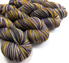 Load image into Gallery viewer, Nevermore on superwash merino/yak/nylon sock yarn.

