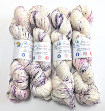 Load image into Gallery viewer, Gothic Speckles on superwash merino/cashmere/nylon DK yarn.
