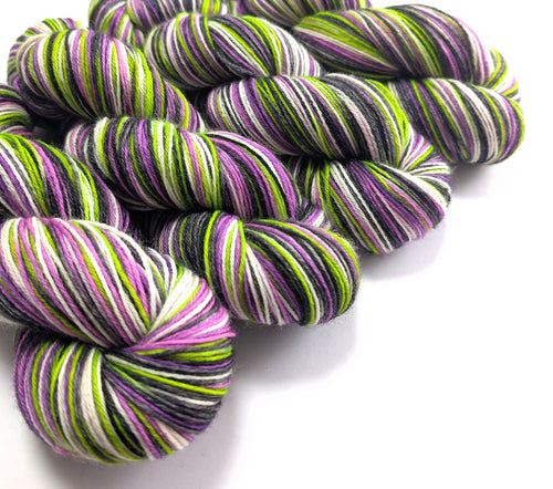 Multicolored yarn skeins on a white background