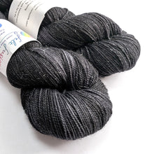 Load image into Gallery viewer, Two skeins of dark gray yarn with labels on a white background
