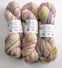 Load image into Gallery viewer, Three skeins of multicolored yarn with 'felt fusion' labels on a white background
