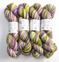 Load image into Gallery viewer, Four skeins of purple and green yarn with &#39;Felt Fusion&#39; labels on a white background
