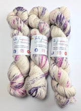 Load image into Gallery viewer, Gothic Speckles on 100% llama 4ply/fingering weight yarn.
