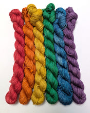 Load image into Gallery viewer, Set of colorful yarn skeins arranged in a rainbow pattern on a white background
