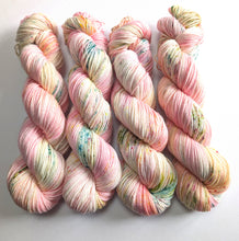Load image into Gallery viewer, Set of colorful yarn skeins on a white background
