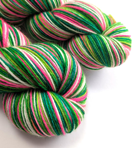 Multicolored yarn skeins on a white background