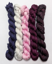 Load image into Gallery viewer, Five skeins of yarn in different colors on a white background
