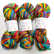 Load image into Gallery viewer, Three skeins of colorful yarn with &#39;felt fusion&#39; labels on a white background
