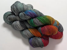 Load image into Gallery viewer, Dark Winter Rainbow on superwash merino/bamboo 4ply/fingering weight.
