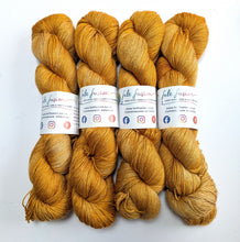 Load image into Gallery viewer, Honey on baby camel/silk 4ply/fingering weight yarn.
