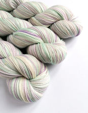 Load image into Gallery viewer, Snow on Snow is a variegated colourway, with pale blue, lilac, silver and white (natural)
