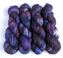 Load image into Gallery viewer, Crushed Grapes on superwash merino/nylon/sparkle sock yarn.
