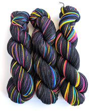 Load image into Gallery viewer, Supernova on superwash merino/nylon sock yarn.

